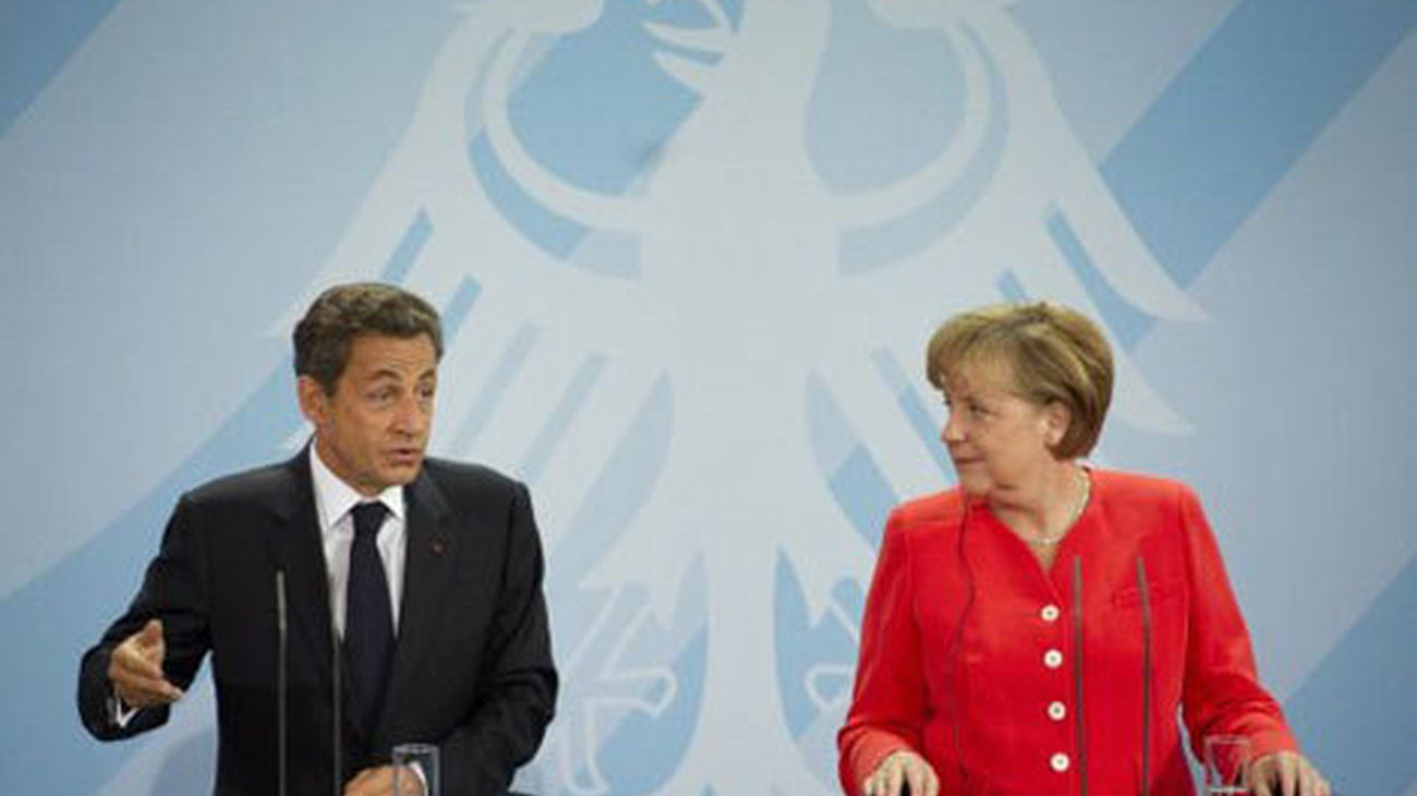 Merkel y Sarkozy piden que la banca privada rescate a Grecia