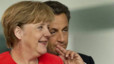 Merkel y Sarzoky buscan in extremis una "línea conjunta" para la eurocumbre