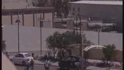 Rebeldes libios se preparan para asaltar un barrio donde podría estar Gadafi