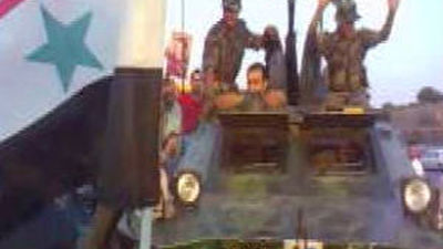 La oposición siria se agrupa en un Consejo Nacional