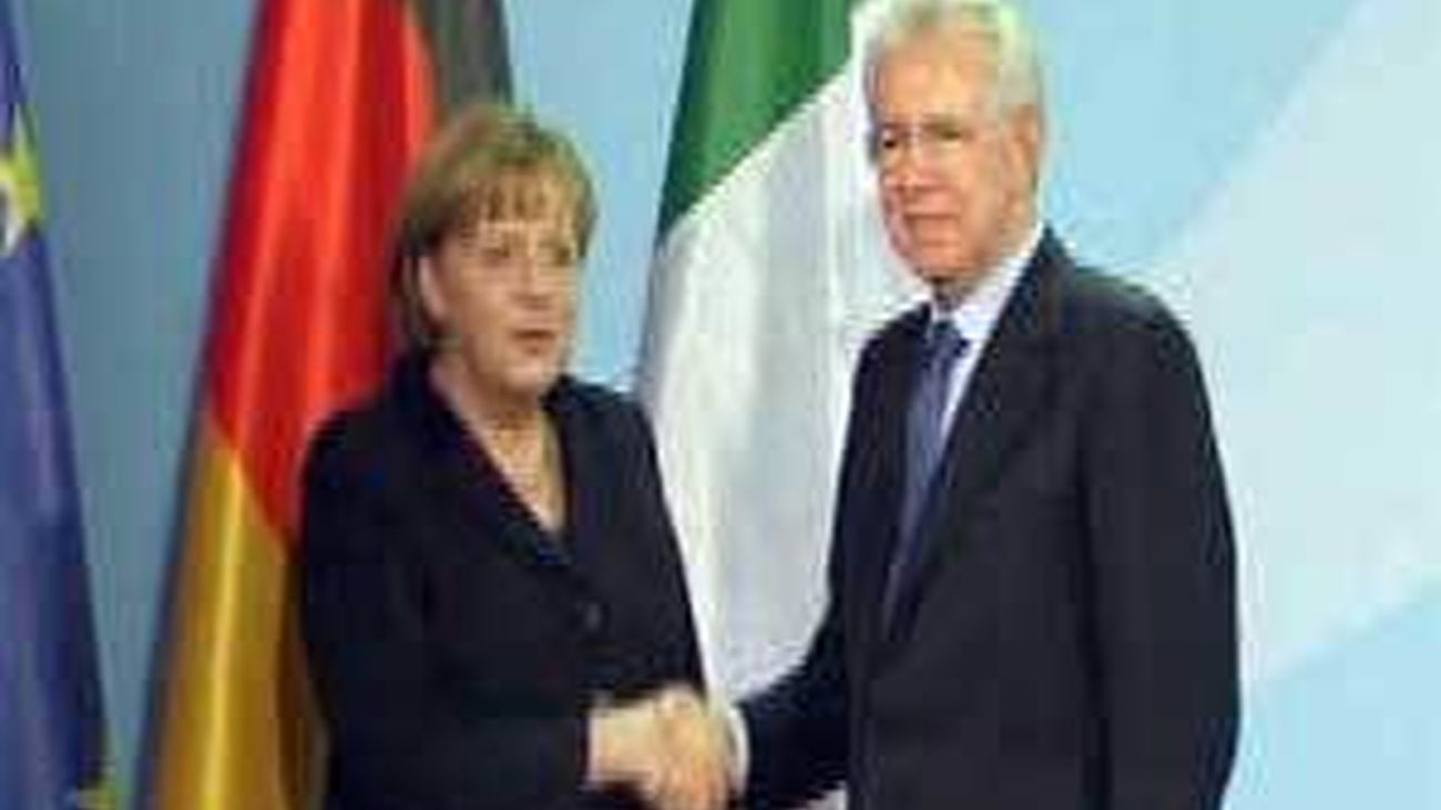 Monti logra el reconocimiento de Merkel a su programa de ajustes