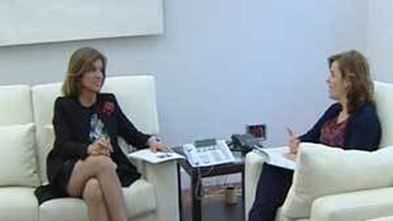 Botella y Soraya Sáenz de Santamaría