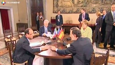 Merkel, Hollande, Monti y Rajoy buscan una solución común a la crisis