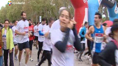 Miles de personas han participado este domingo en la carrera popular 'Corre por el Niño'