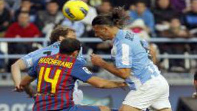 El Málaga defiende la cuarta posición ante el intratable Barcelona