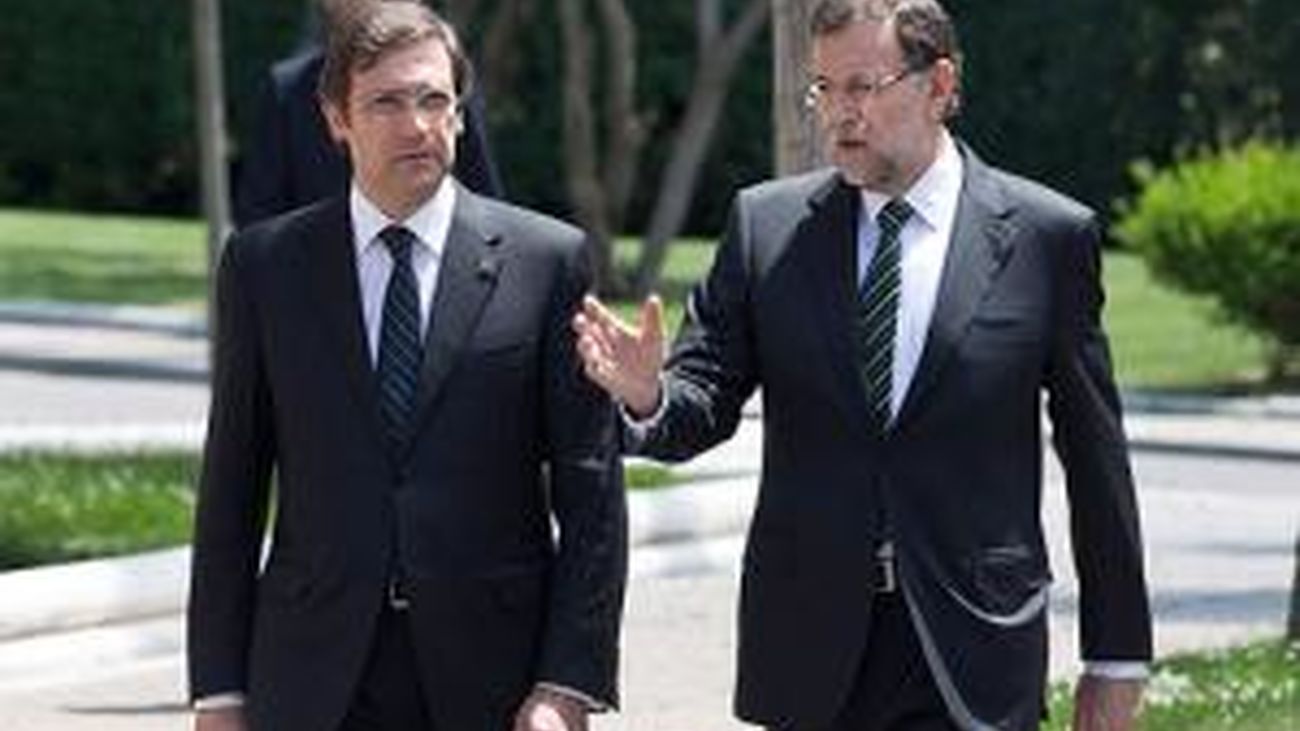 Rajoy y Coelho hacen frente común y piden a la UE que cumpla los acuerdos