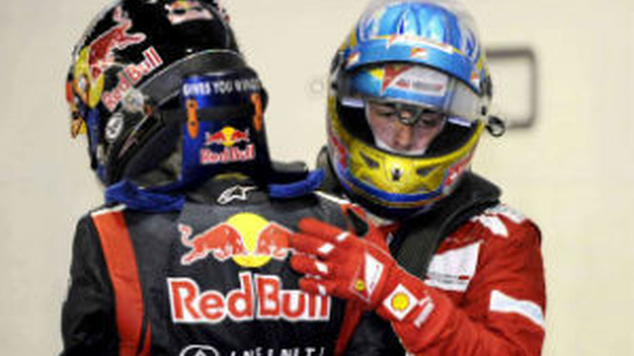 Fernando Alonso con Sebastian Vettel