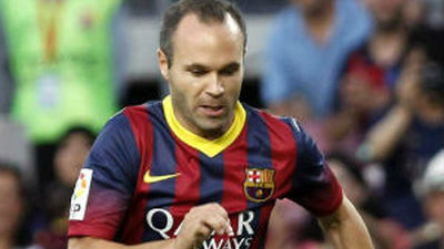 Iniesta firma la ampliación del contrato con el Barça hasta 2018