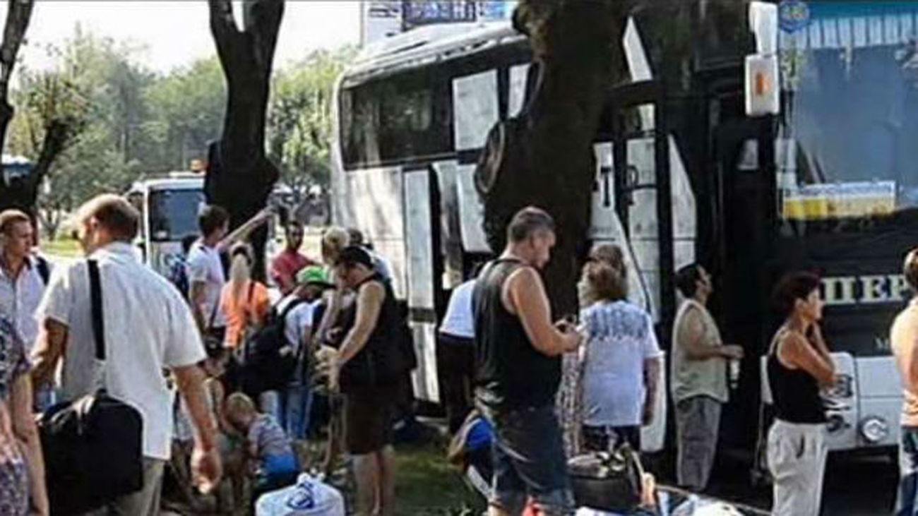 Ucranianos que huyen