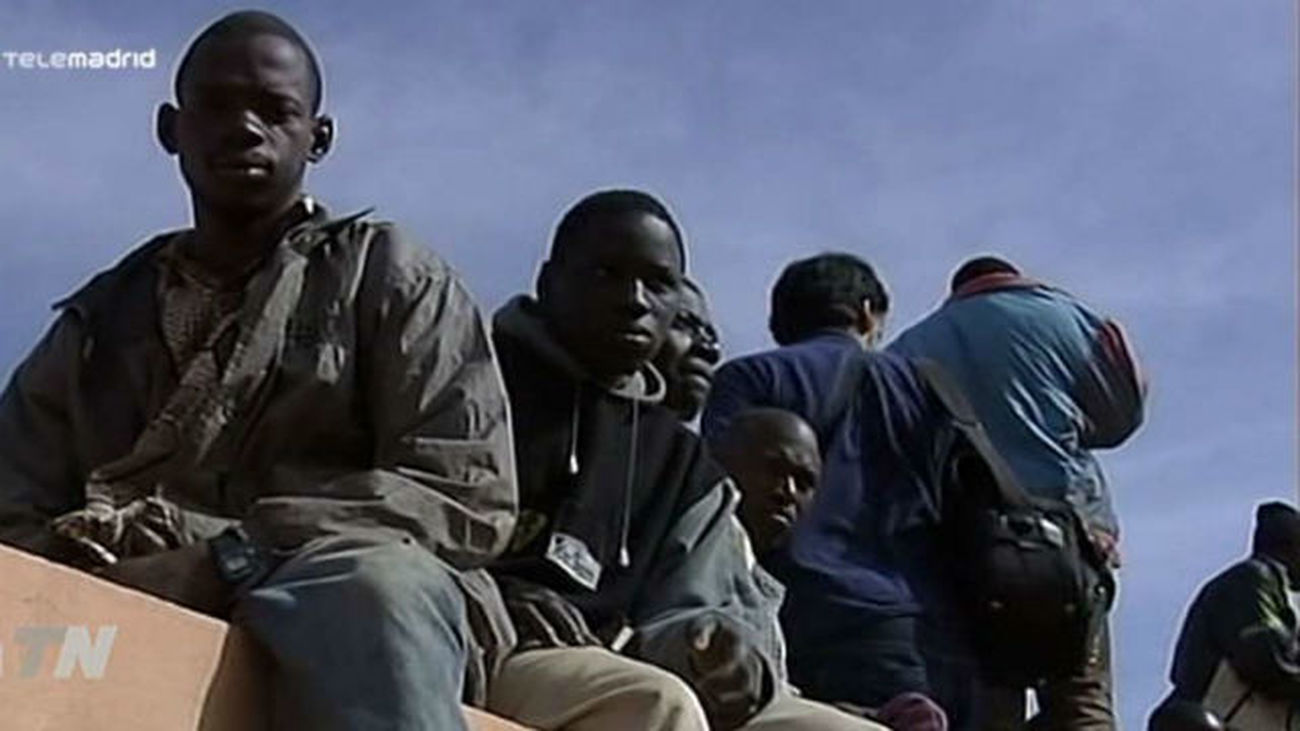 Inmigrantes en la valla de Melilla