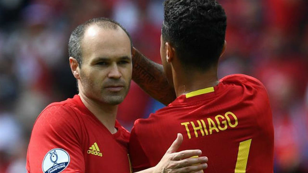 Iniesta y Thiago