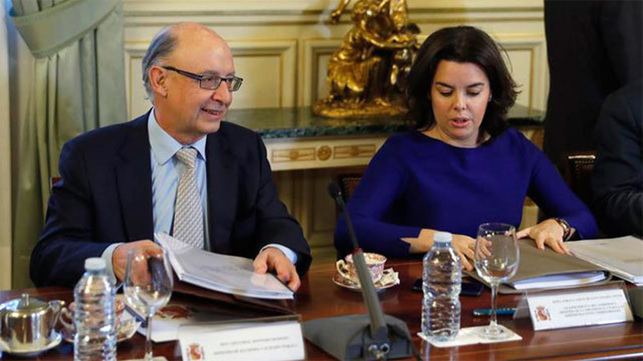 Cristobal Montoro y Soraya Sáenz de Santamaría