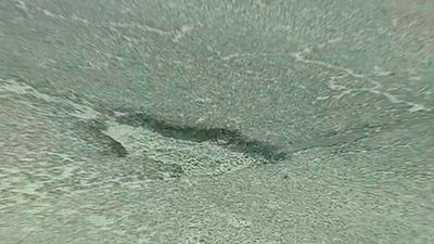 Los vecinos de la calle Antonio López de Madrid reclaman un asfaltado urgente