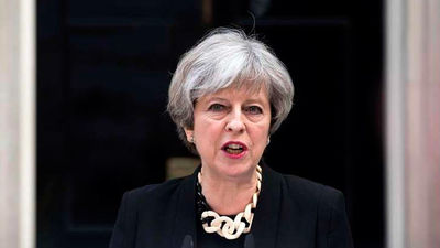 May defiende reformas legales para luchar contra el extremismo islámico