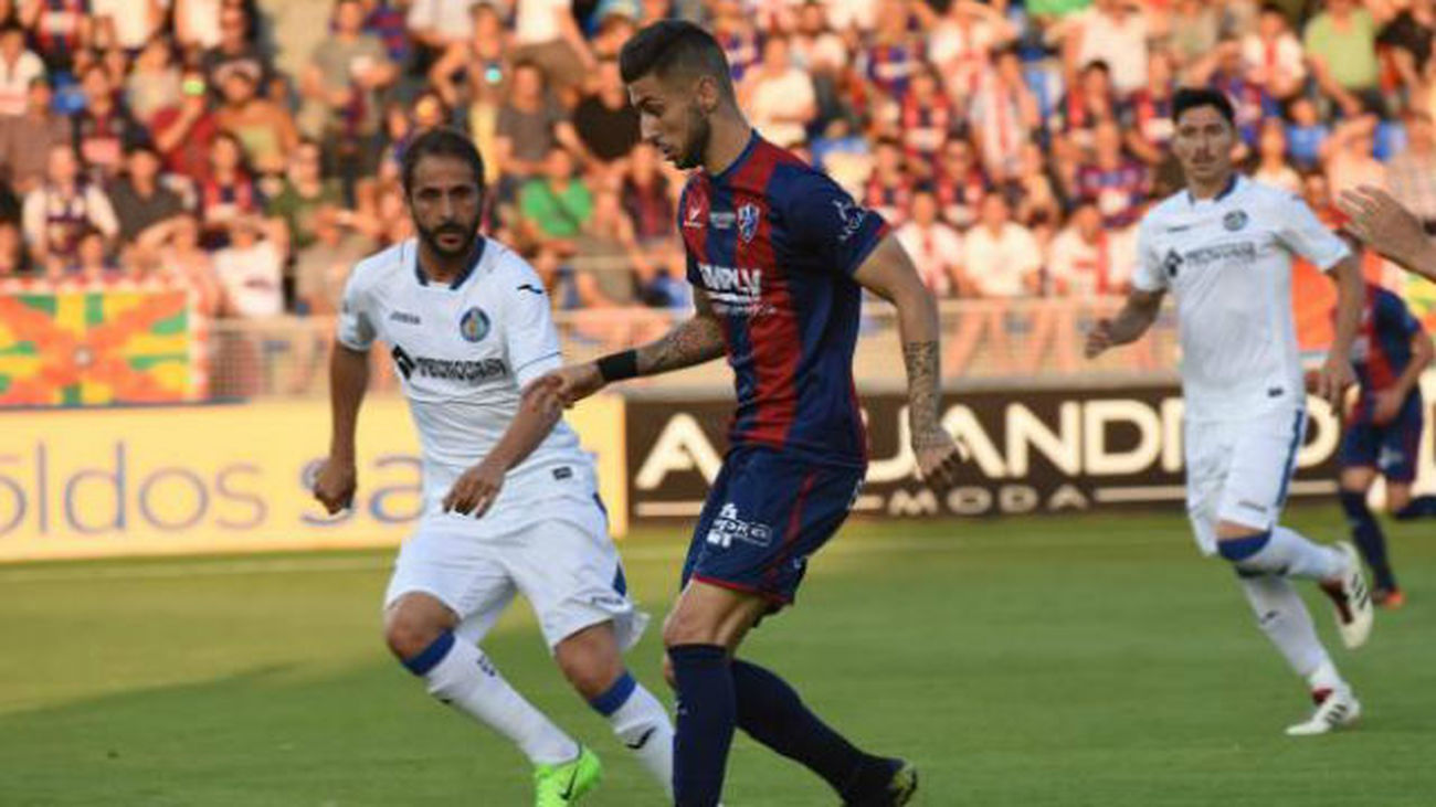 2-2. Getafe y Huesca postergan al Coliseum su candidatura al ascenso