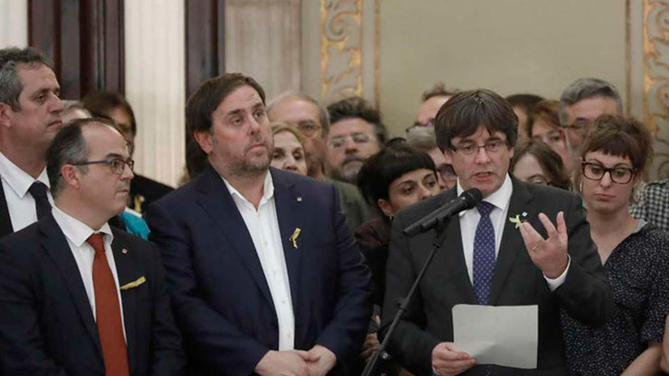 Carles Puigdemont, junto a Oriol Junqueras