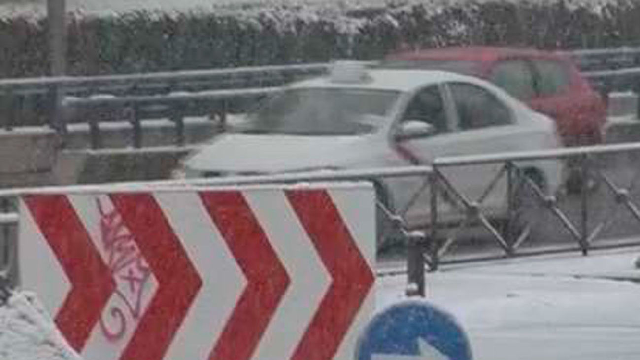 Madrid atascada, en una jornada en alerta naranja