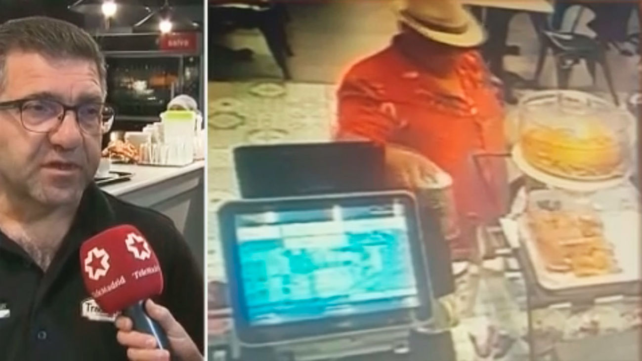 Una pareja roba el bote de la propina de una cafetería