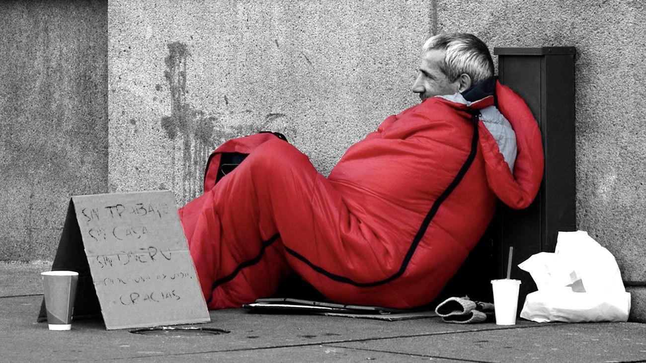 Persona sin hogar, pidiendo en la calle