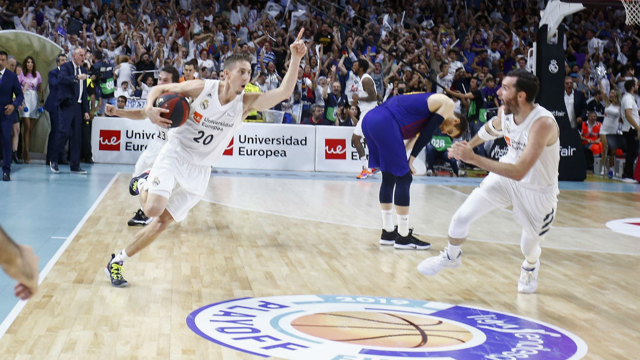Jaycee Carroll y Rudy Fernández