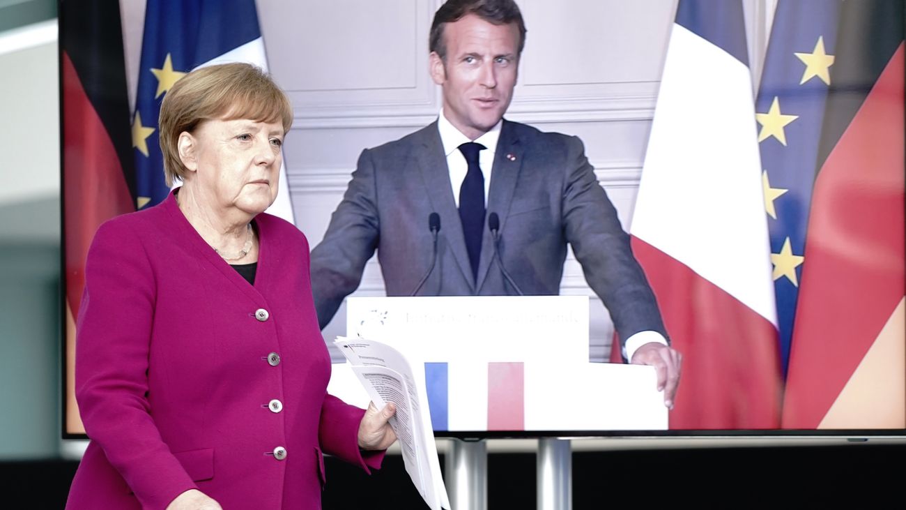 Merkel y Macron durante la reunión que han mantenido