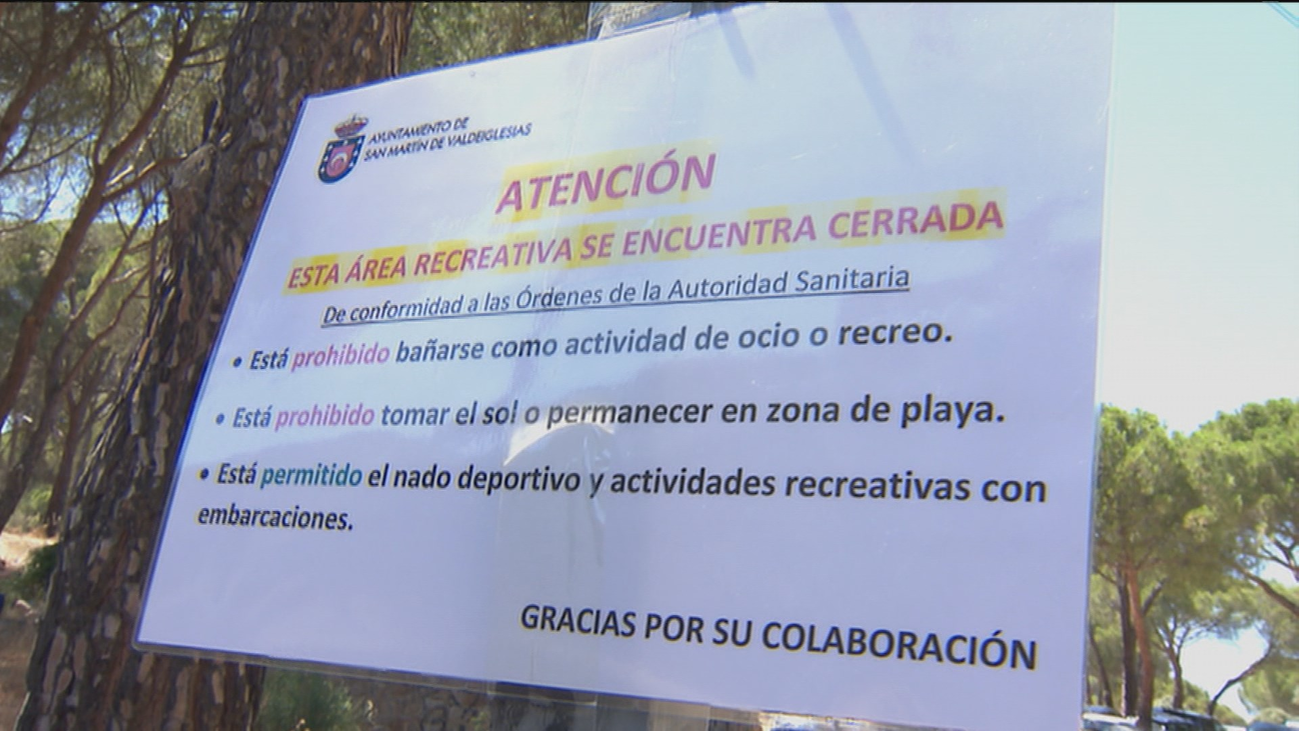 Limitación y controles en los accesos al Pantano de San Juan, donde el baño no está permitido