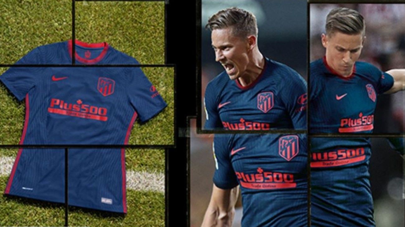 La segunda equipación del Atlético 2020-21, azul oscuro con detalles rojos