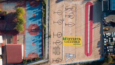 Greenpeace transforma un aparcamiento en Hortaleza  en una pista de atletismo