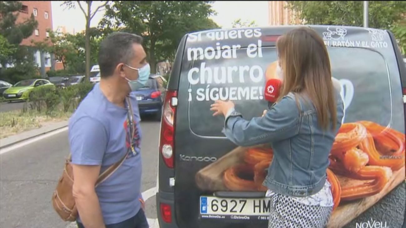 ‘Si quieres mojar el churro, ¡Sígueme!', el original eslogan de una churrería de Vallecas