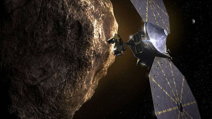 Recreación de la sonda 'Lucy' junto a un asteroide. / NASA