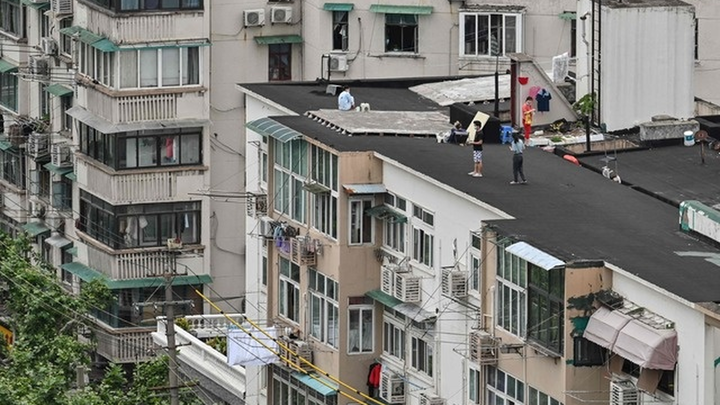 Ciudadanos chinos en una azotea / TWITTER