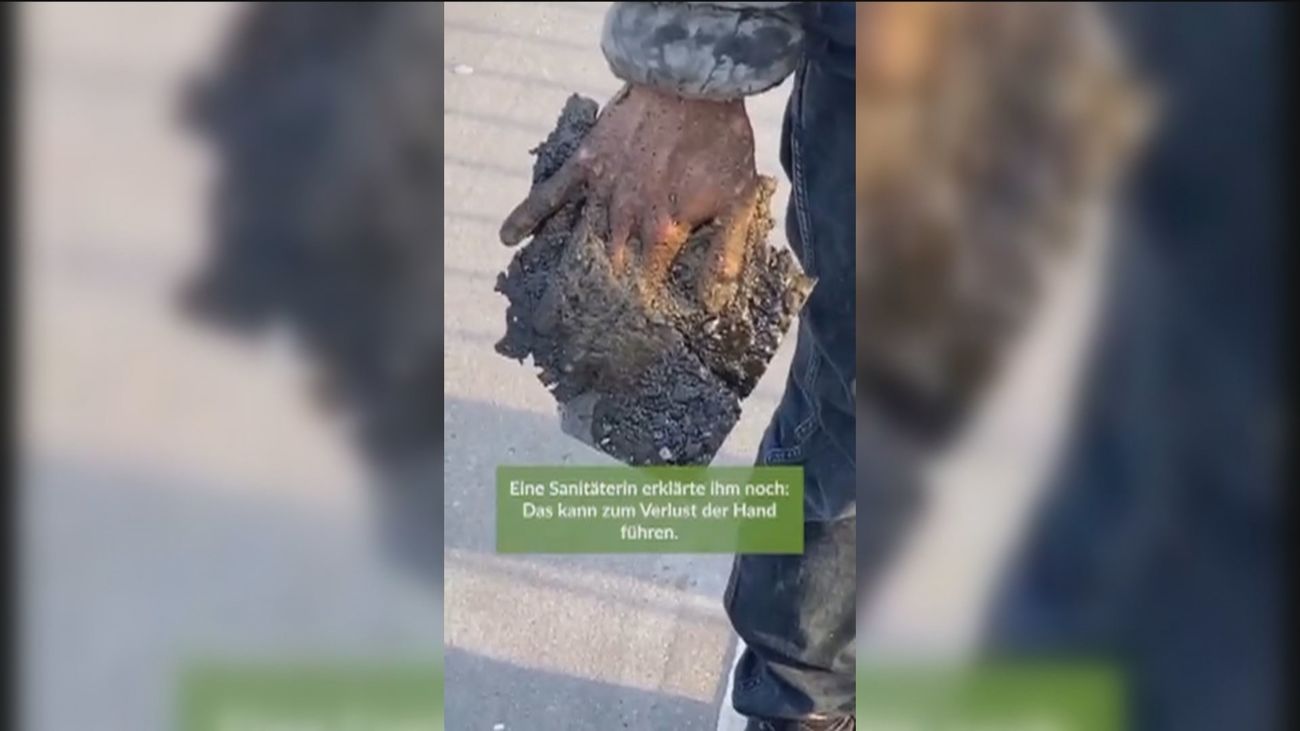 Un activista pega sus manos al asfalto como protesta en Alemania... y hay que cortar el asfalto para liberarle