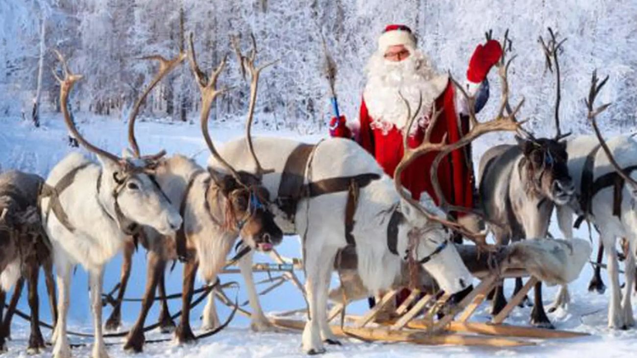 Papá Noel con sus renos