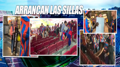 Aficionados del Barcelona arrancan asientos y carteles del Camp Nou