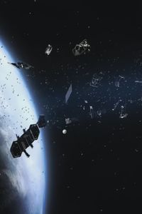 Ilustración de una nube de basura espacial en torno a la Tierra