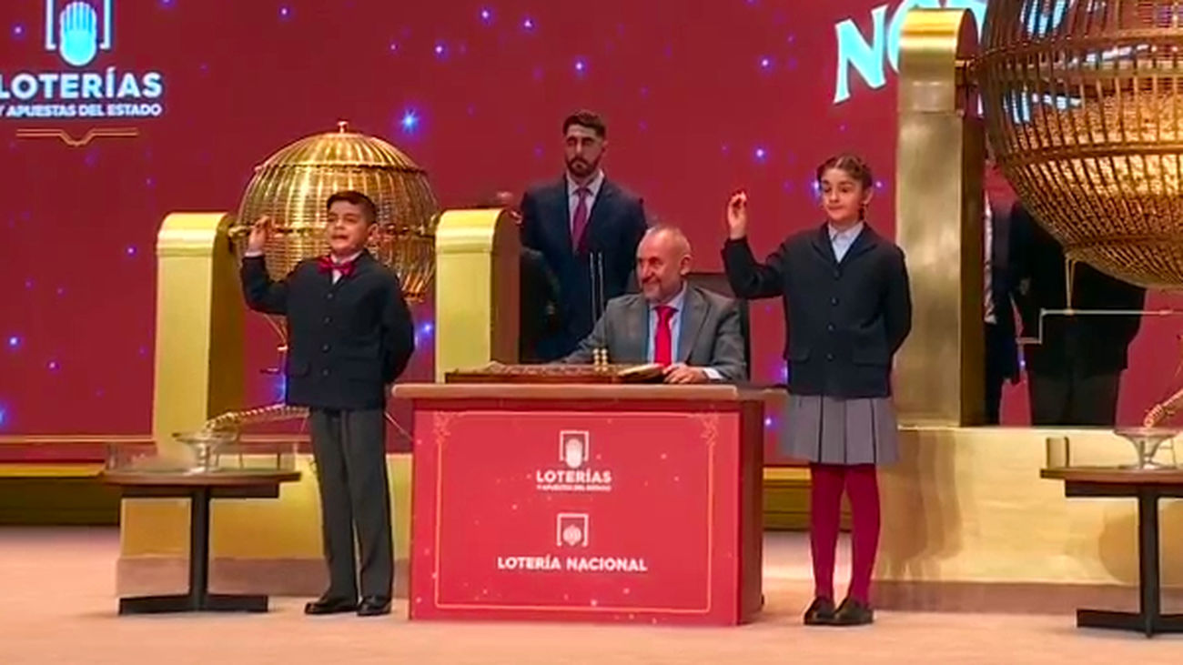 El 77715, un 'viajero' quinto premio de la Lotería de Navidad que deja millones en San Lorenzo de El Escorial, Leganés y Móstoles