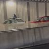 Los bomberos trabajan para desaguar el túnel de la T-4  en Barajas y retirar una decena de vehículos