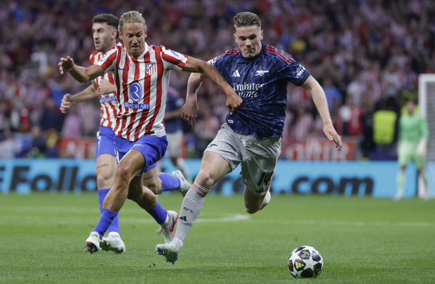 Marcos Llorente ante el Arsenal / EFE