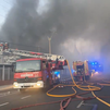 Arde la nave industrial de un almacén y bazar en Leganés
