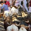 12 corredores heridos en el tercer encierro de San Fermín, uno por asta de toro en el brazo